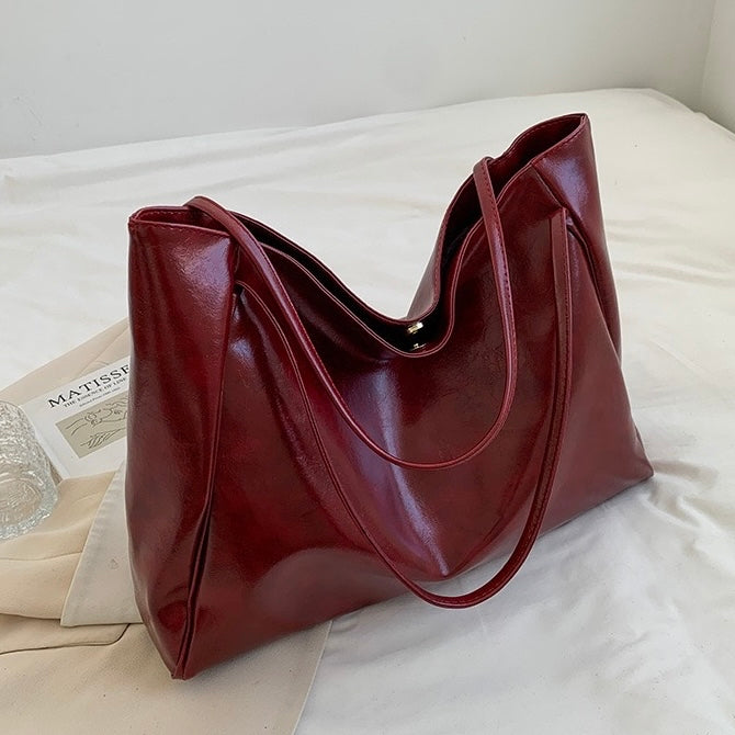 Patricia™ | Glänzende Lederhandtasche